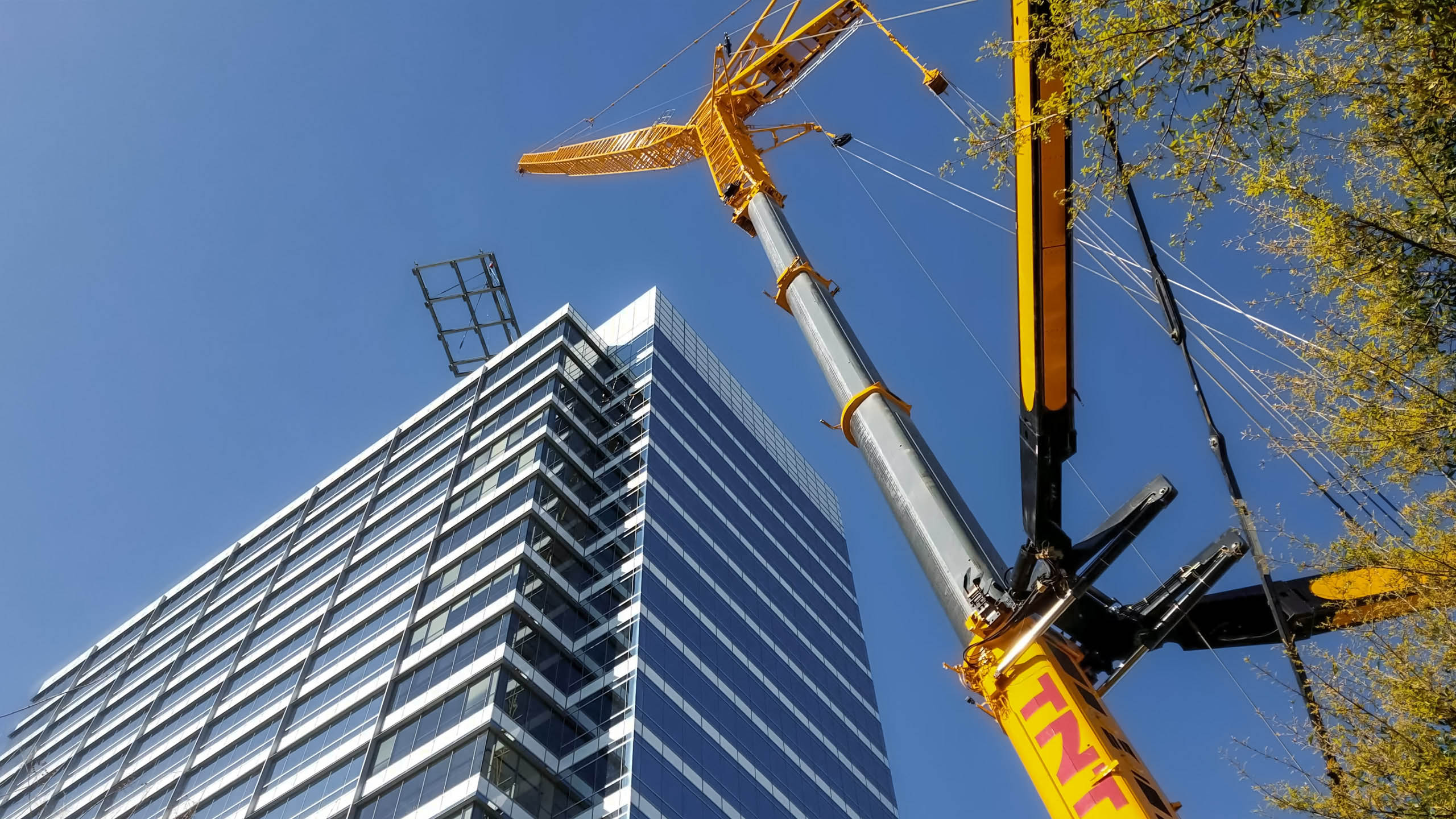 TNT All-Terrain Crane Structure Lift Downtown
